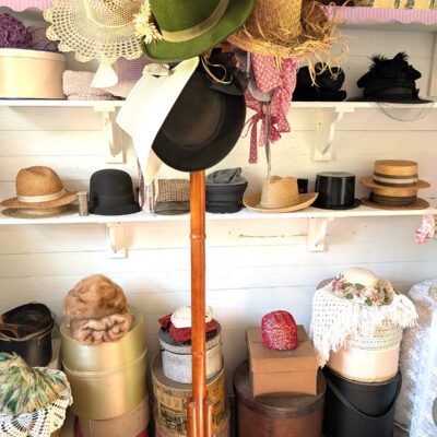 Hide and seek in Belle’s Hat Shoppe at Heritage Village Festival