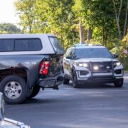 A gray Chevy Silverado pickup truck received rear-end damage after it was struck in a three-vehicle accident Thursday afternoon. — DN Photo | Cory Smith