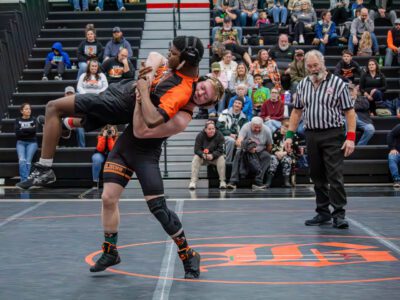Belding wrestling opens conference action with pair of commanding wins at home quad